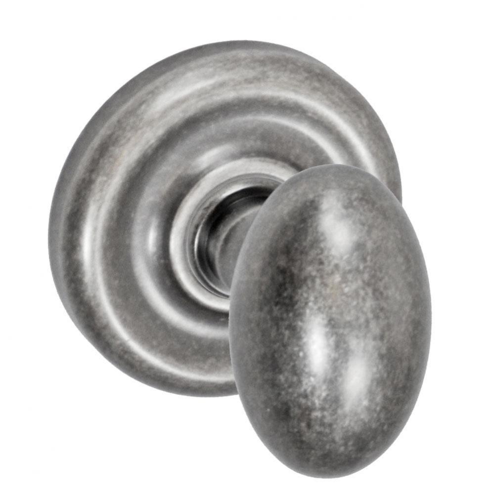 Egg Knob with Contoured Radius Rose Passage Set in Antique