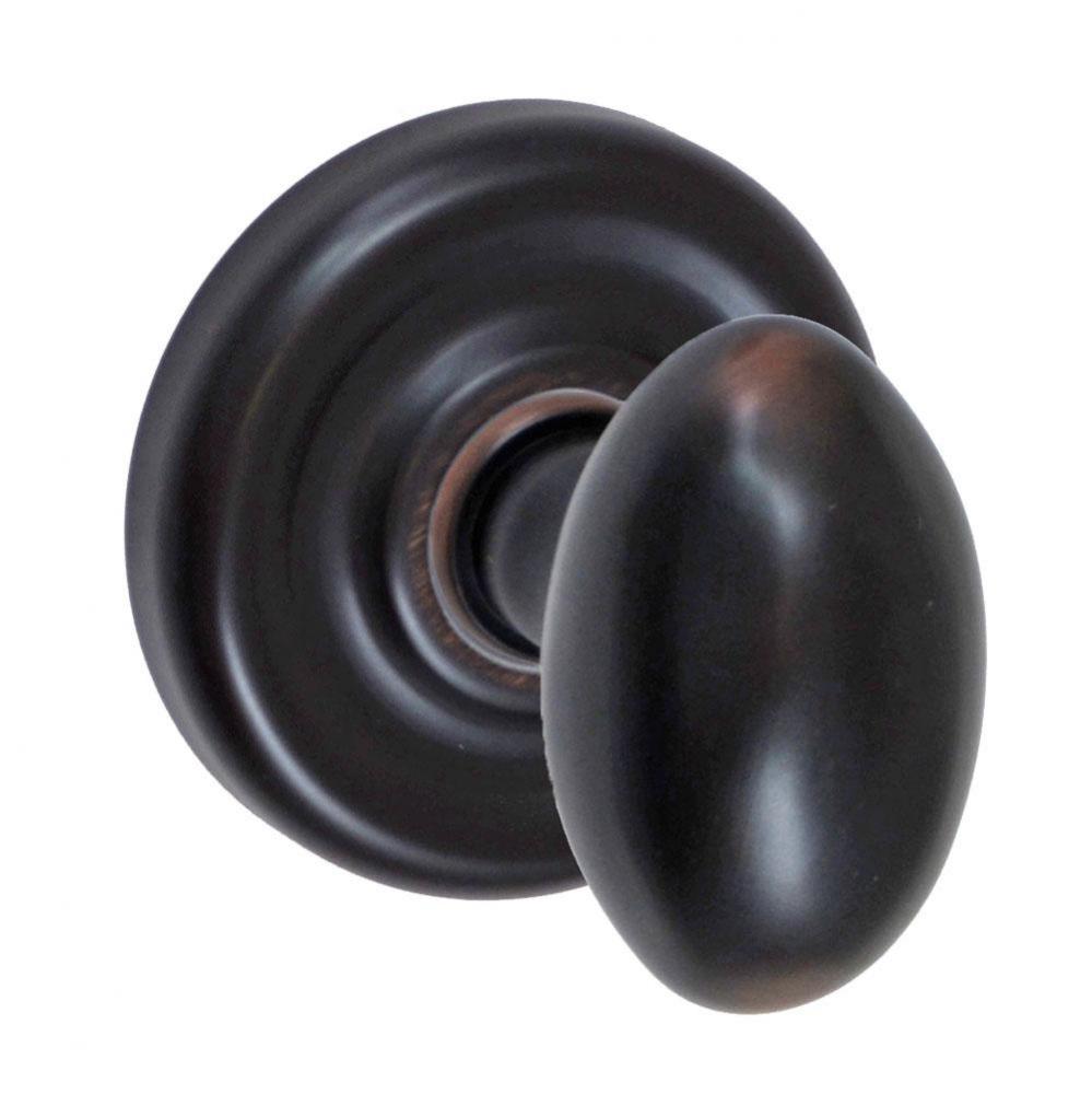 Egg Knob with Contoured Radius Rose Privacy Set in Oil Rubbed