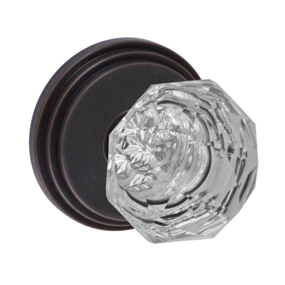 Crystal Clear Knob with Stepped  Rose Passage Set in Oil Rubbed