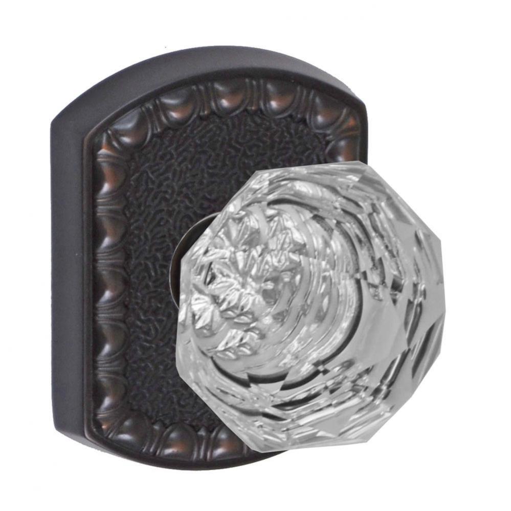Crystal Clear Knob with Olde World Rose Passage Set in Oil Rubbed