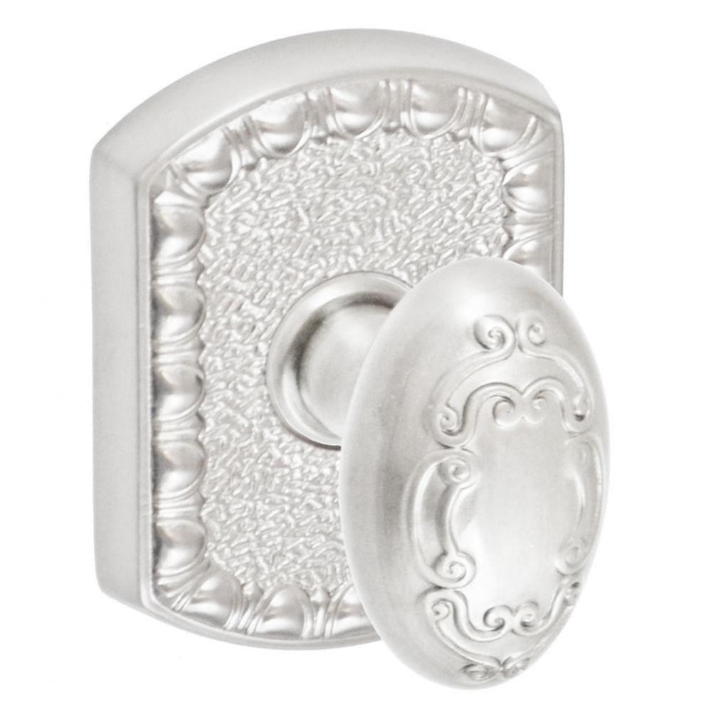 Scroll Egg Knob with Olde World Rose Passage Set in Brushed