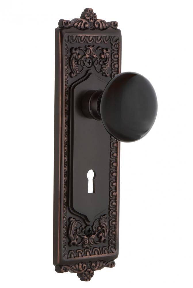 Nostalgic Warehouse Egg & Dart Plate with Keyhole Single Dummy Black Porcelain Door Knob in Ti