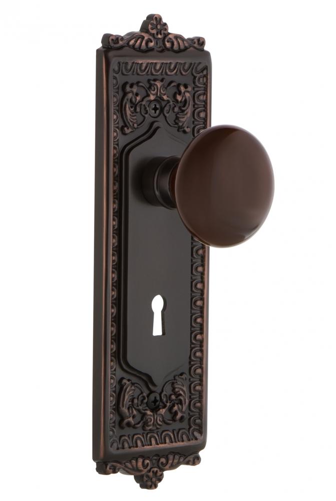 Nostalgic Warehouse Egg & Dart Plate with Keyhole Single Dummy Brown Porcelain Door Knob in Ti