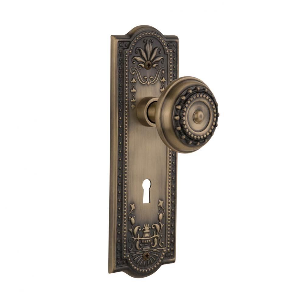 Nostalgic Warehouse Meadows Plate with Keyhole Privacy Meadows Door Knob in Antique Brass