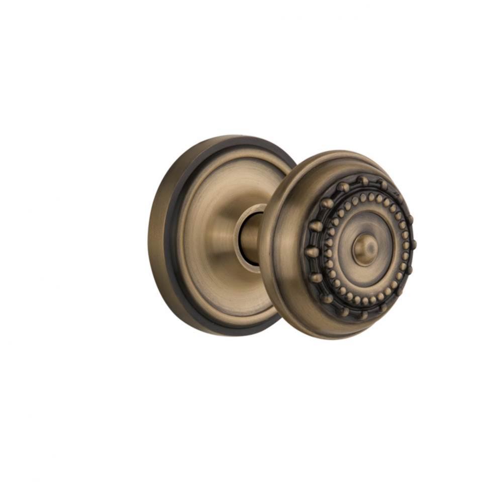 Nostalgic Warehouse Classic Rosette Privacy Meadows Door Knob in Antique Brass