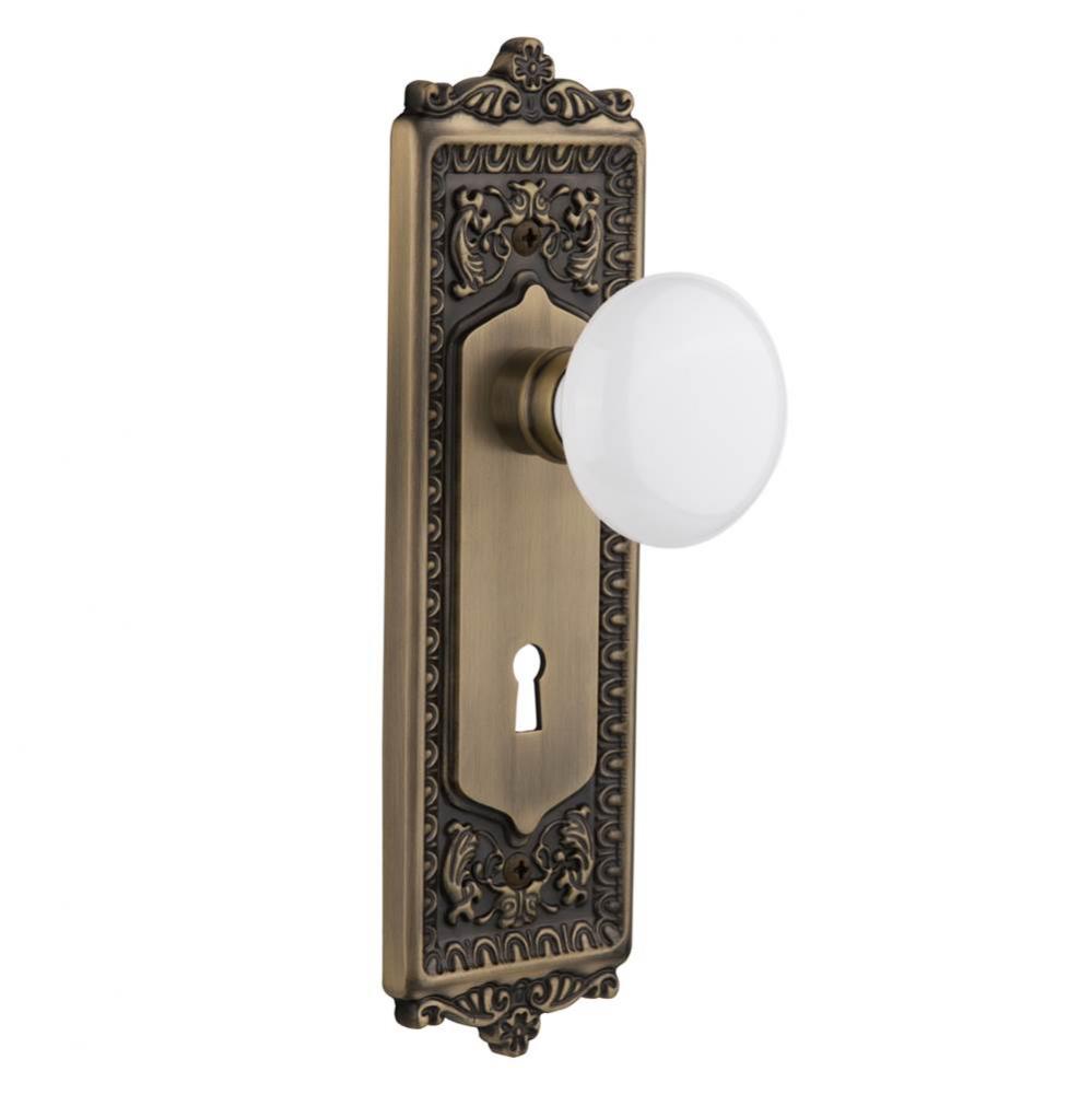 Nostalgic Warehouse Egg & Dart Plate Interior Mortise White Porcelain Door Knob in Antique Bra