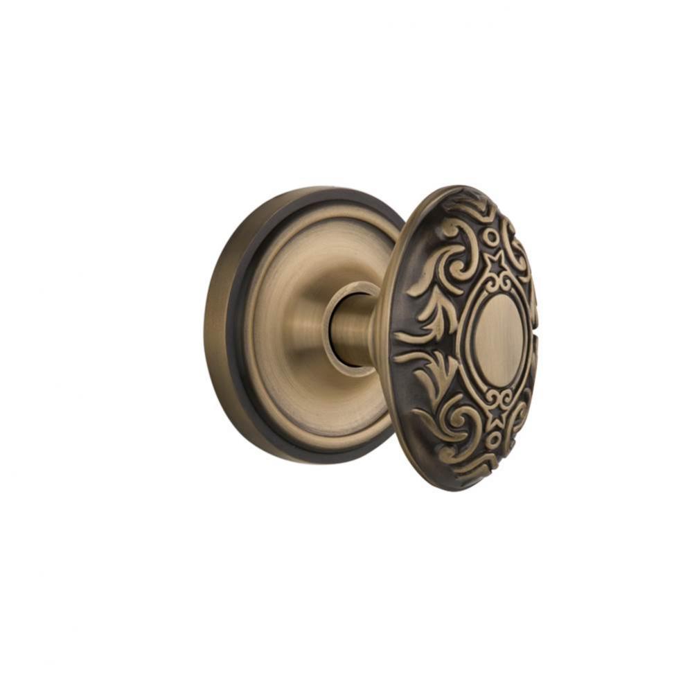 Nostalgic Warehouse Classic Rosette Passage Victorian Door Knob in Antique Brass