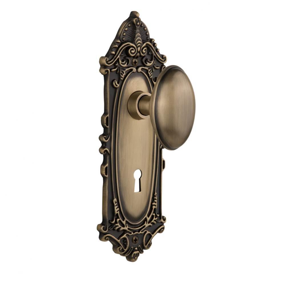 Nostalgic Warehouse Victorian Plate with Keyhole Privacy Homestead Door Knob in Antique Brass