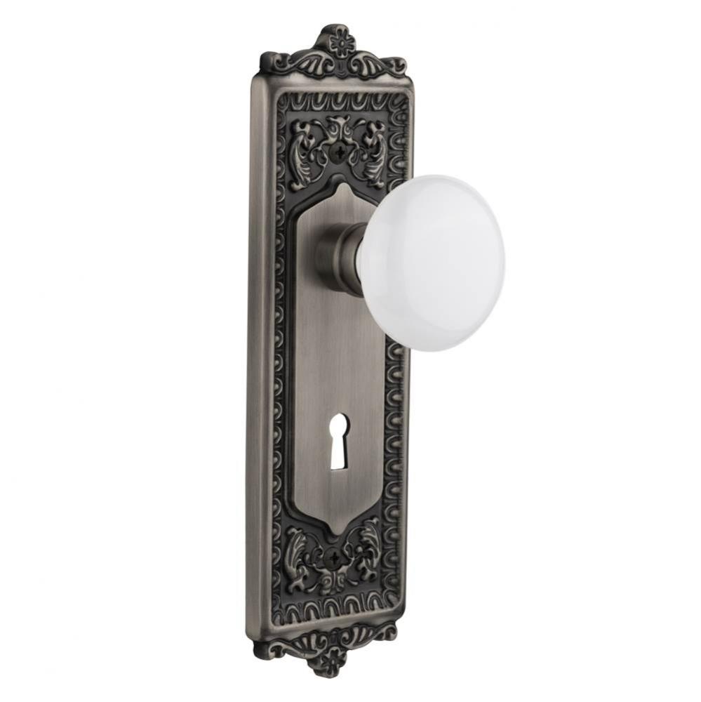 Nostalgic Warehouse Egg & Dart Plate with Keyhole Passage White Porcelain Door Knob in Antique