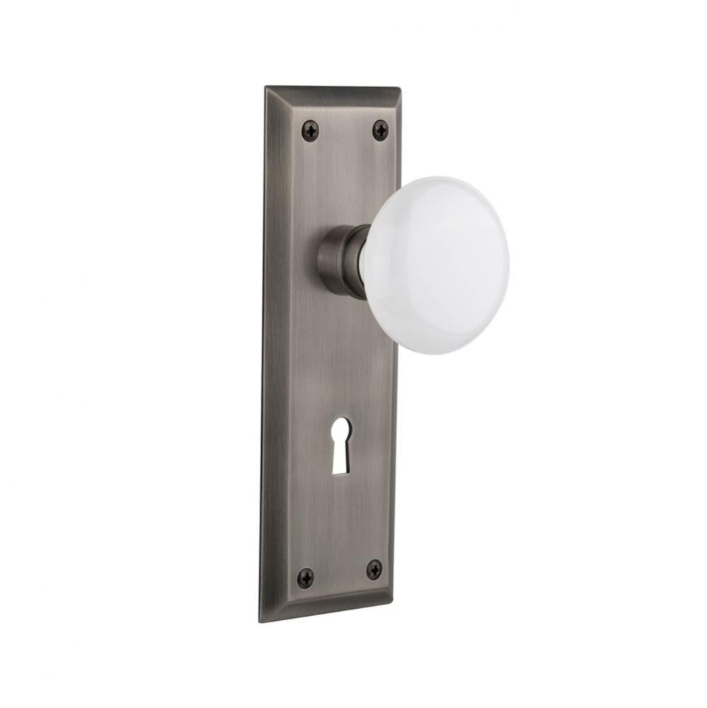 Nostalgic Warehouse New York Plate with Keyhole Passage White Porcelain Door Knob in Antique Pewte