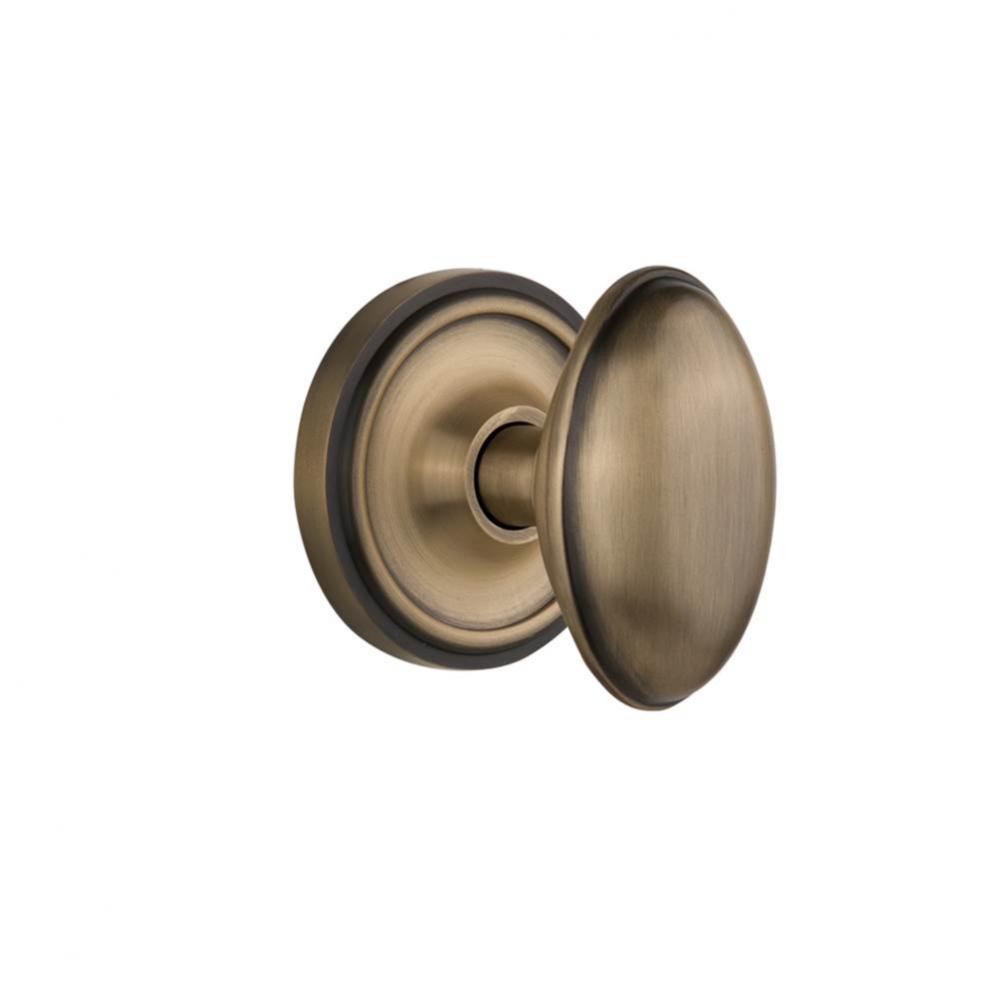 Nostalgic Warehouse Classic Rosette Privacy Homestead Door Knob in Antique Brass