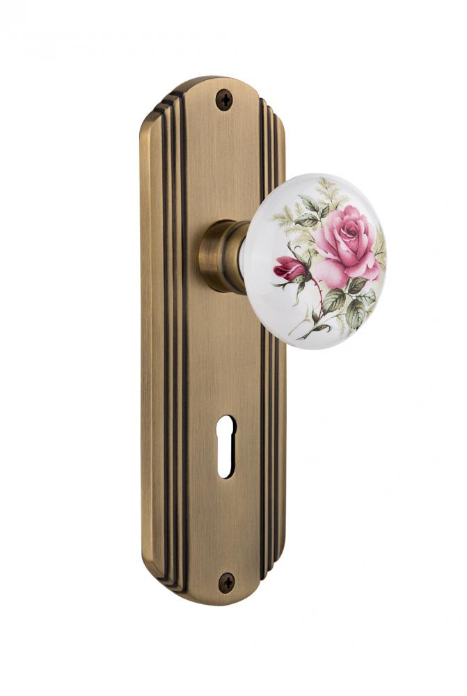 Nostalgic Warehouse Deco Plate with Keyhole Privacy White Rose Porcelain Door Knob in Antique Bras