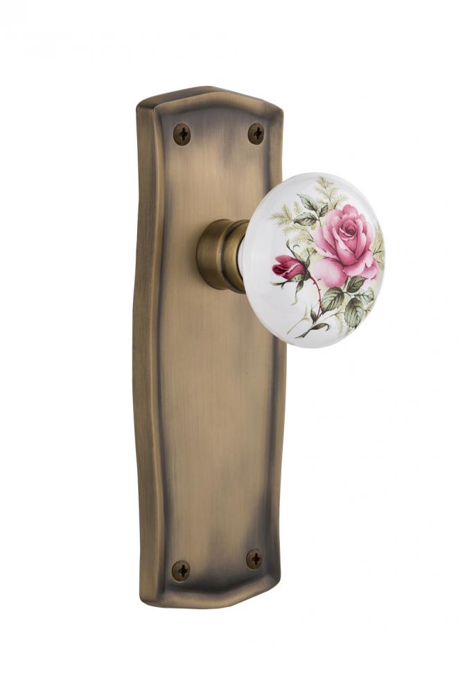 Nostalgic Warehouse Prairie Plate Passage White Rose Porcelain Door Knob in Antique Brass