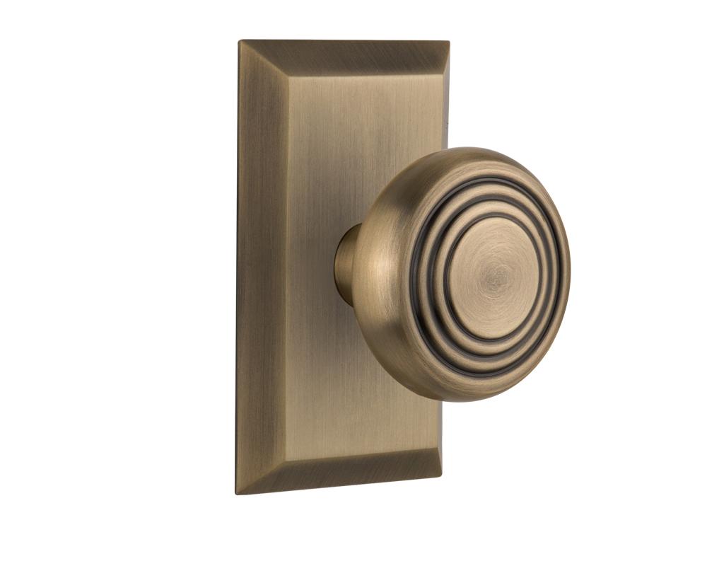 Nostalgic Warehouse Studio Plate Privacy Deco Door Knob in Antique Brass