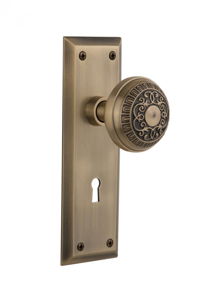 Nostalgic Warehouse New York Plate with Keyhole Privacy Egg & Dart Door Knob in Antique Brass