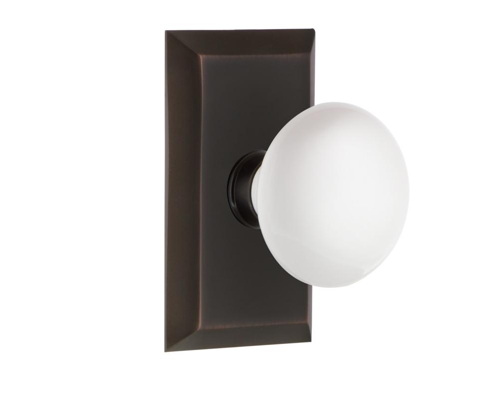 Nostalgic Warehouse Studio Plate Passage White Porcelain Door Knob in Timeless Bronze