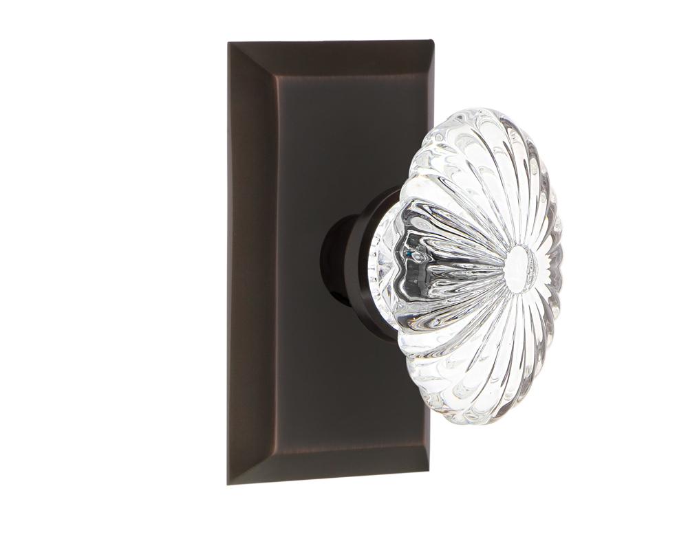 Nostalgic Warehouse Studio Plate Privacy Oval Fluted Crystal Glass Door Knob in Timeless Bronze