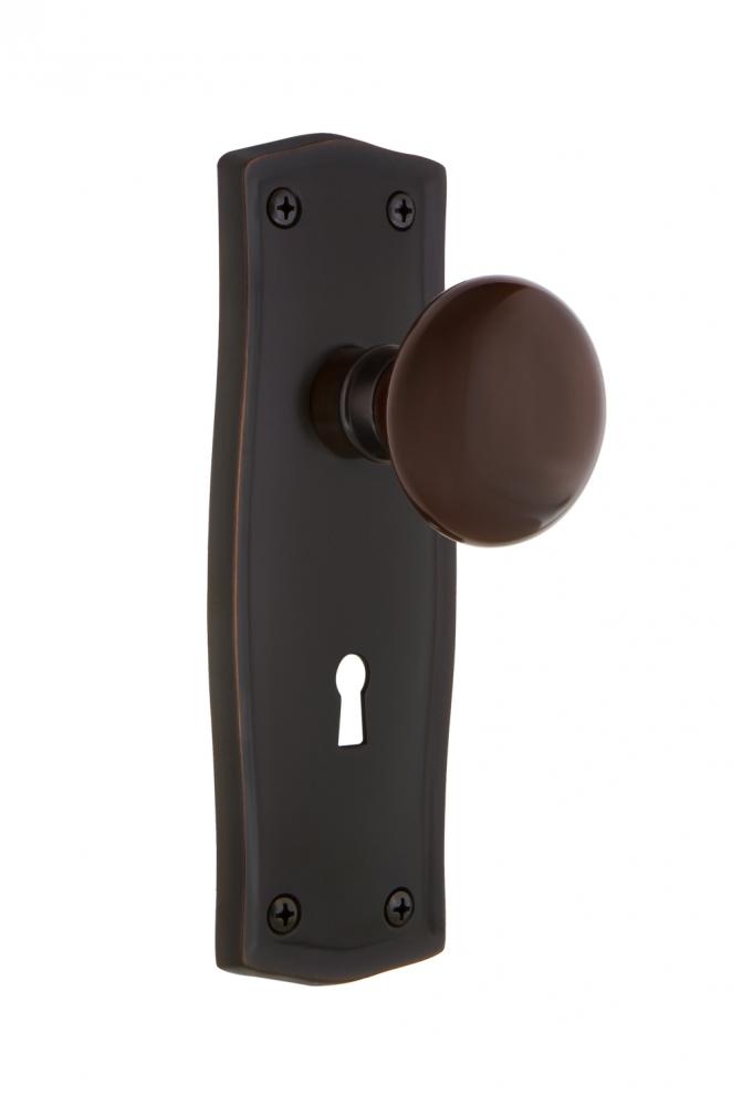 Nostalgic Warehouse Prairie Plate with Keyhole Privacy Brown Porcelain Door Knob in Timeless Bronz