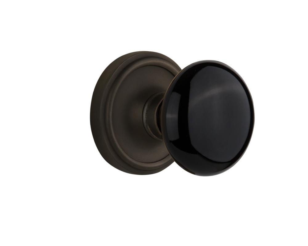 Nostalgic Warehouse Classic Rosette Passage Black Porcelain Door Knob in Oil-Rubbed Bronze