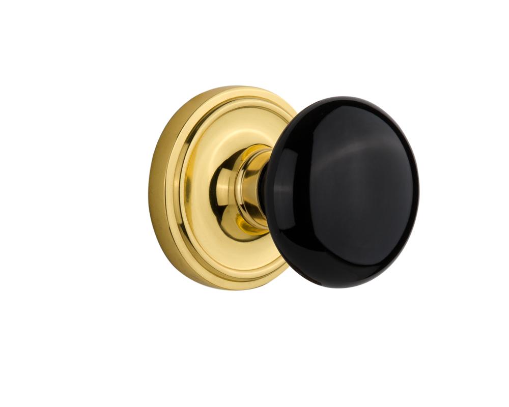 Nostalgic Warehouse Classic Rosette Passage Black Porcelain Door Knob in Unlacquered Brass