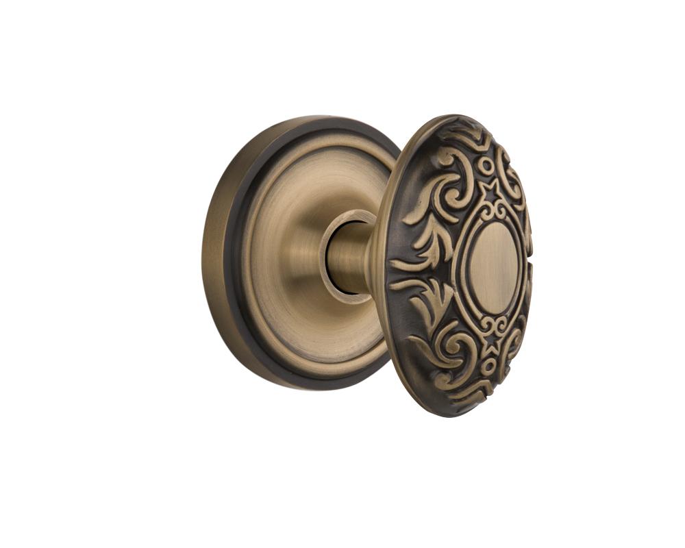 Nostalgic Warehouse Classic Rosette Passage Victorian Door Knob in Antique Brass