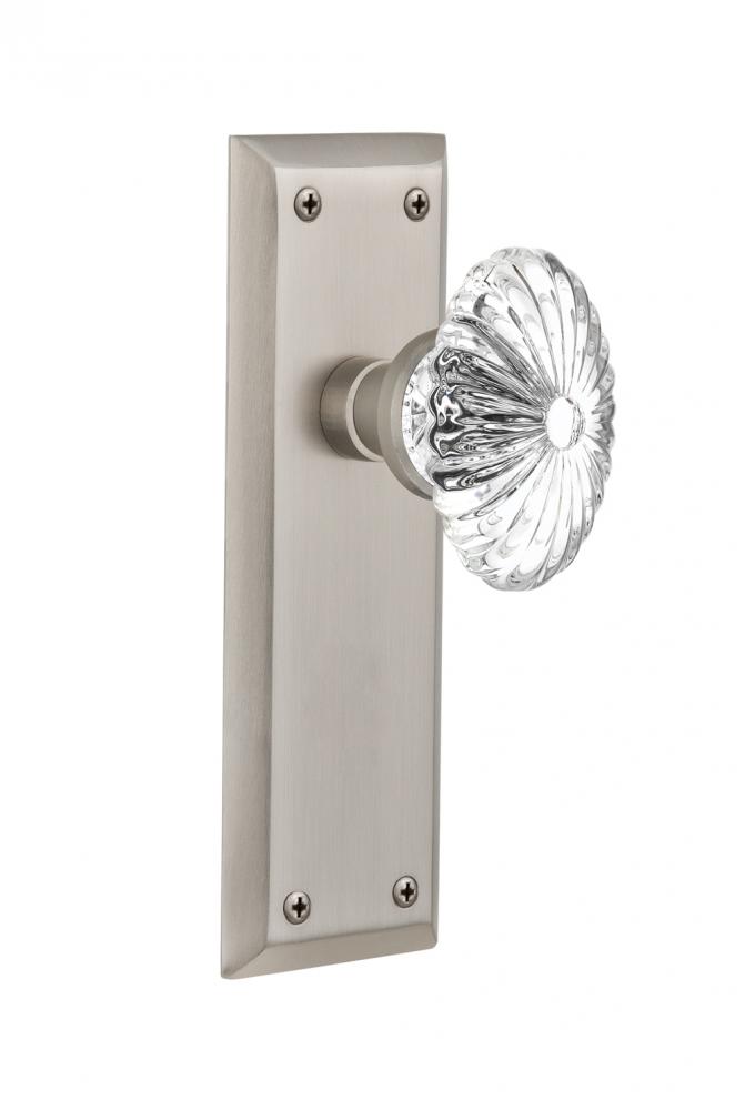 Nostalgic Warehouse New York Plate Passage Oval Fluted Crystal Glass Door Knob in Satin Nickel