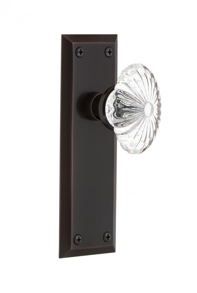 Nostalgic Warehouse New York Plate Passage Oval Fluted Crystal Glass Door Knob in Timeless Bronze