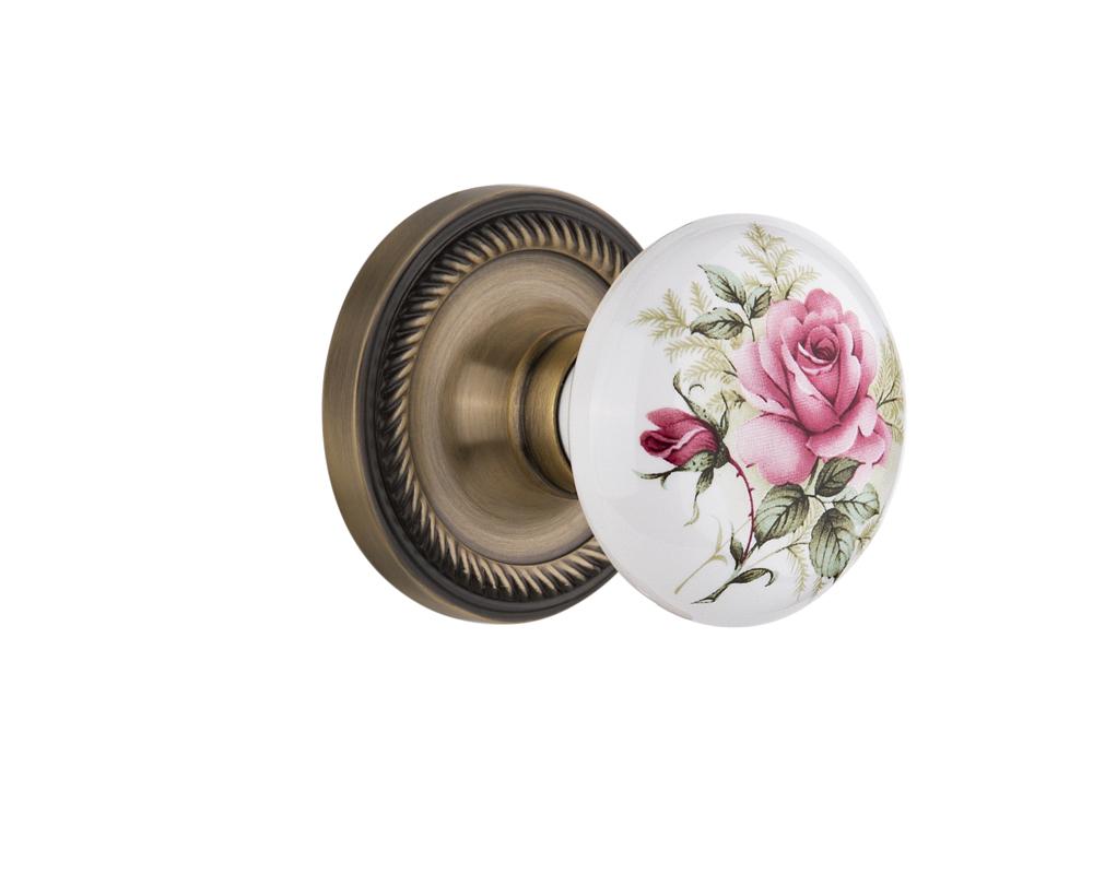 Nostalgic Warehouse Rope Rosette Passage White Rose Porcelain Door Knob in Antique Brass