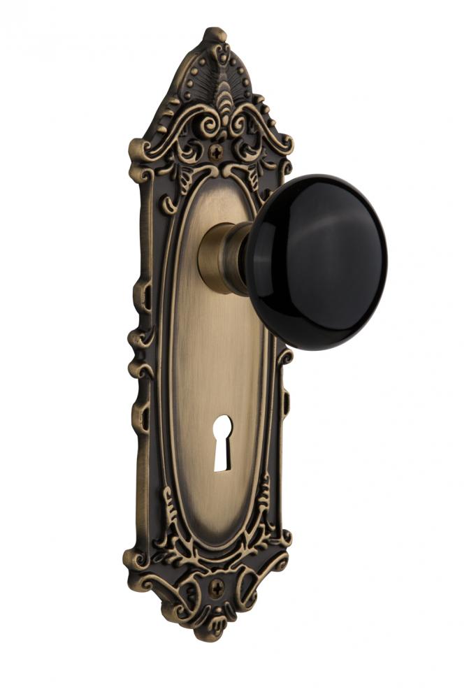 Nostalgic Warehouse Victorian Plate with Keyhole Passage Black Porcelain Door Knob in Antique Bras