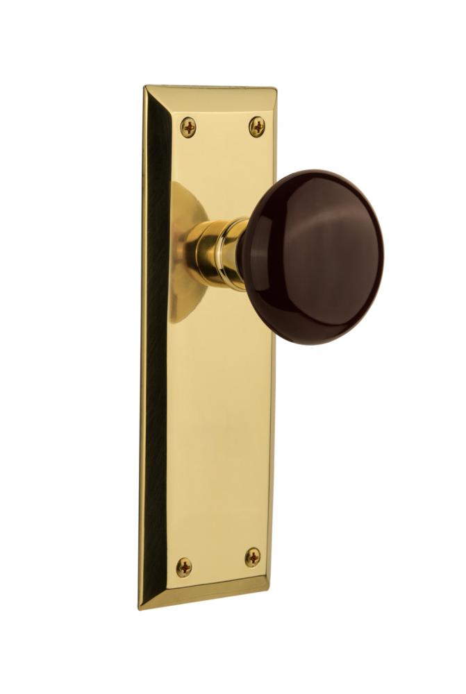 Nostalgic Warehouse New York Plate Single Dummy Brown Porcelain Door Knob in Polished Brass