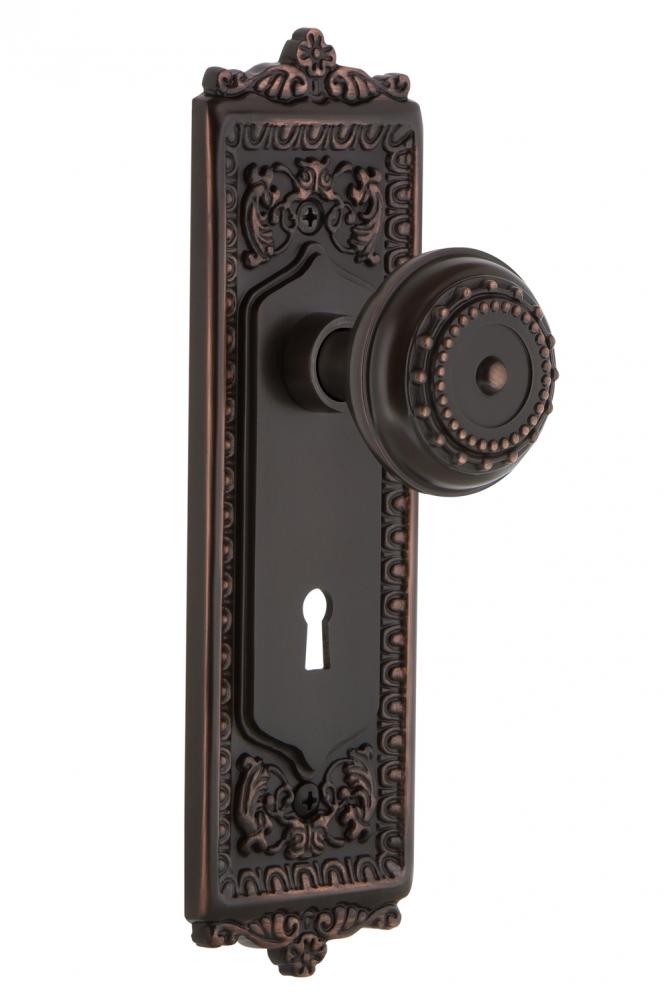 Nostalgic Warehouse Egg & Dart Plate with Keyhole Passage Meadows Door Knob in Timeless Bronze