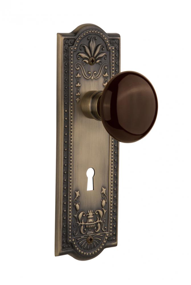 Nostalgic Warehouse Meadows Plate Interior Mortise Brown Porcelain Door Knob in Antique Brass