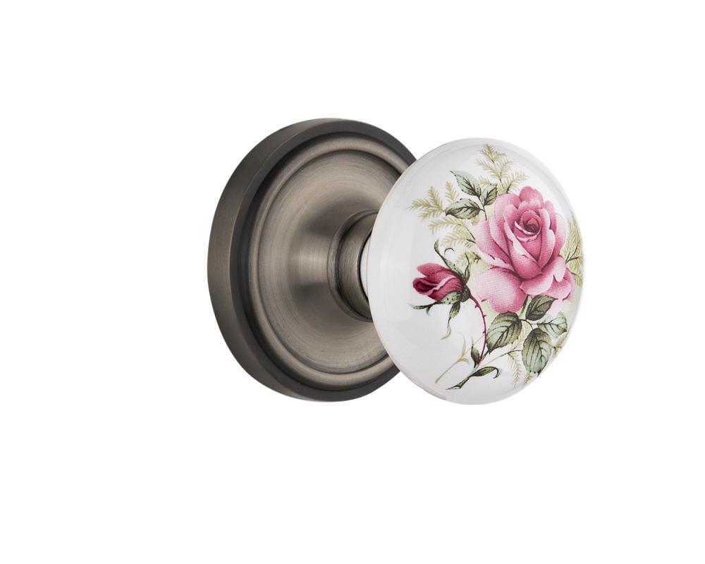 Nostalgic Warehouse Classic Rosette Passage White Rose Porcelain Door Knob in Antique Pewter