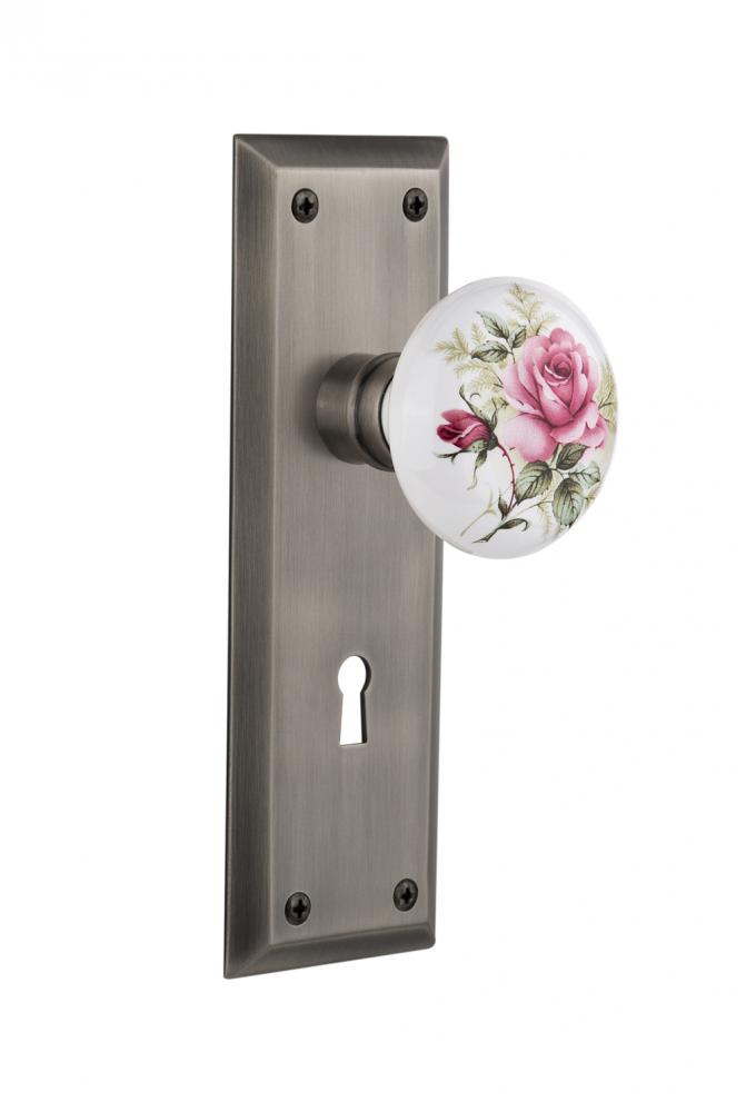 Nostalgic Warehouse New York Plate with Keyhole Passage White Rose Porcelain Door Knob in Antique