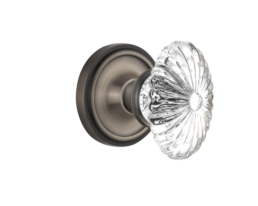 Nostalgic Warehouse Classic Rosette Passage Oval Fluted Crystal Glass Door Knob in Antique Pewter