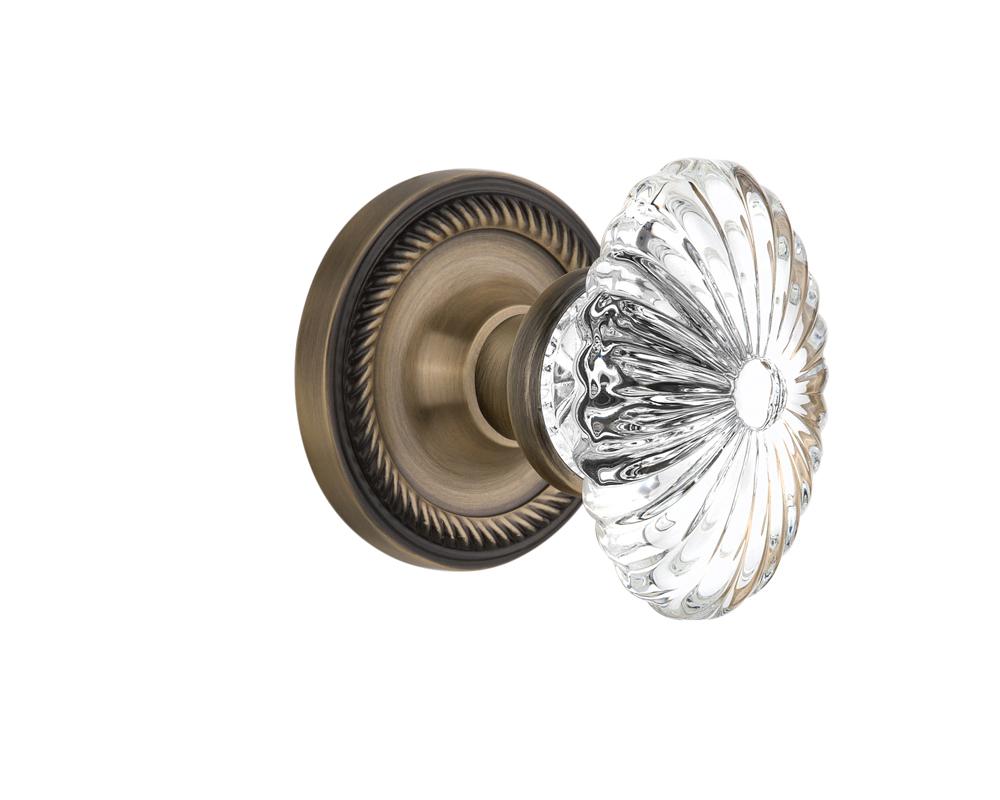 Nostalgic Warehouse Rope Rosette Single Dummy Oval Fluted Crystal Glass Door Knob in Antique Brass