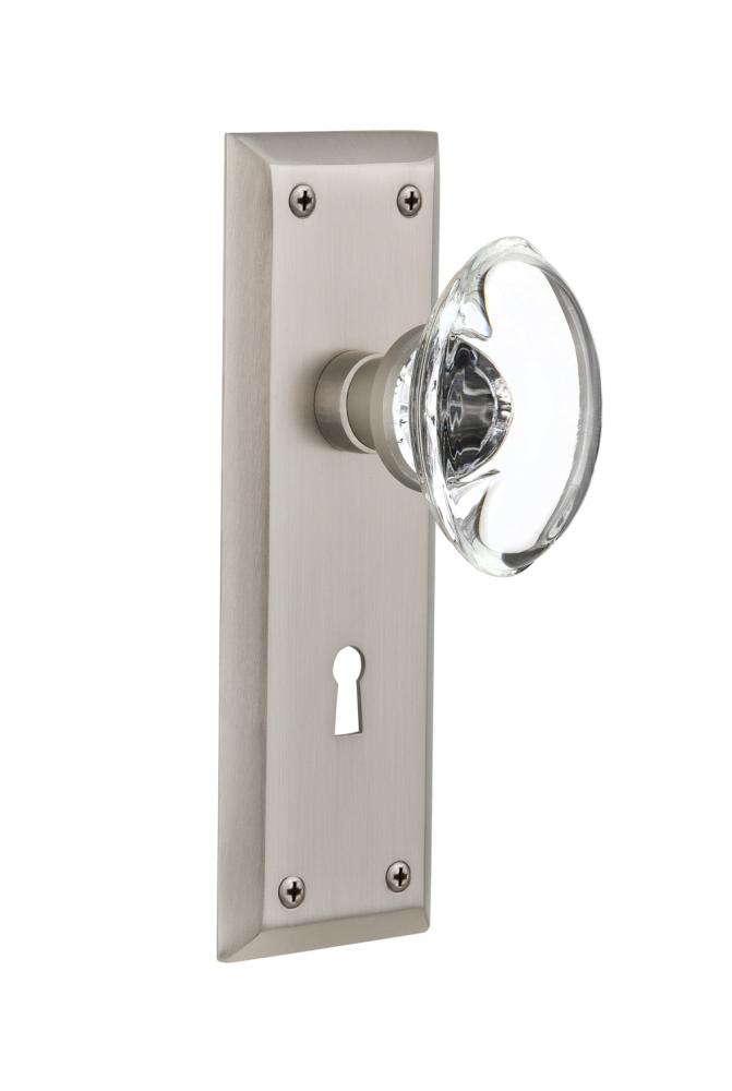Nostalgic Warehouse New York Plate with Keyhole Passage Oval Clear Crystal Glass Door Knob in Sati