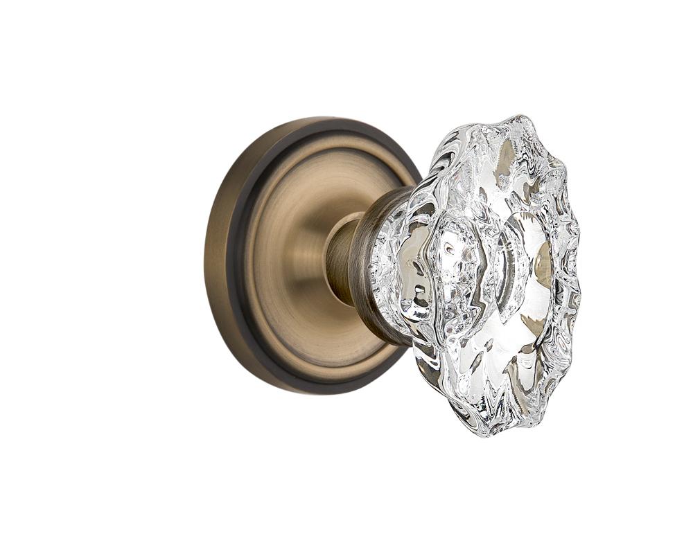 Nostalgic Warehouse Classic Rosette Privacy Chateau Door Knob in Antique Brass