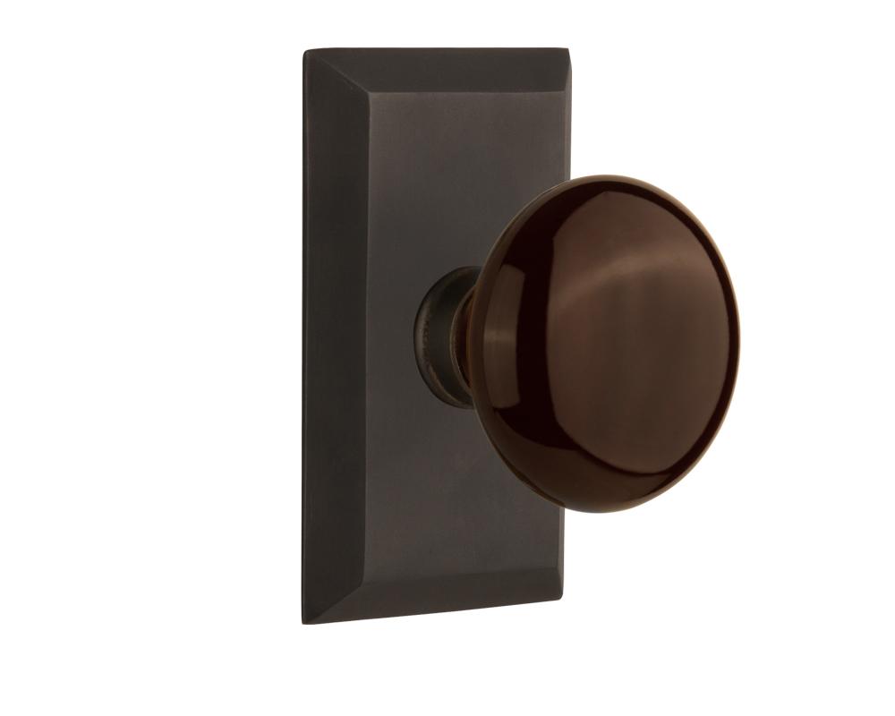 Nostalgic Warehouse Studio Plate Passage Brown Porcelain Door Knob in Oil-Rubbed Bronze