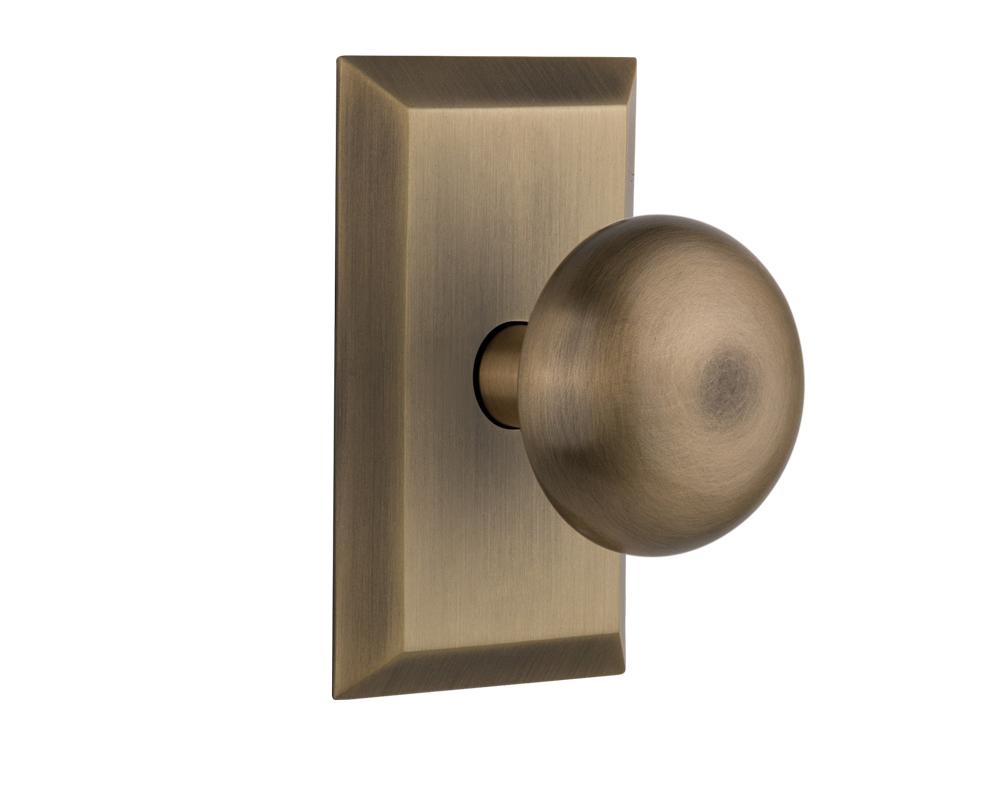 Nostalgic Warehouse Studio Plate Single Dummy New York Door Knob in Antique Brass