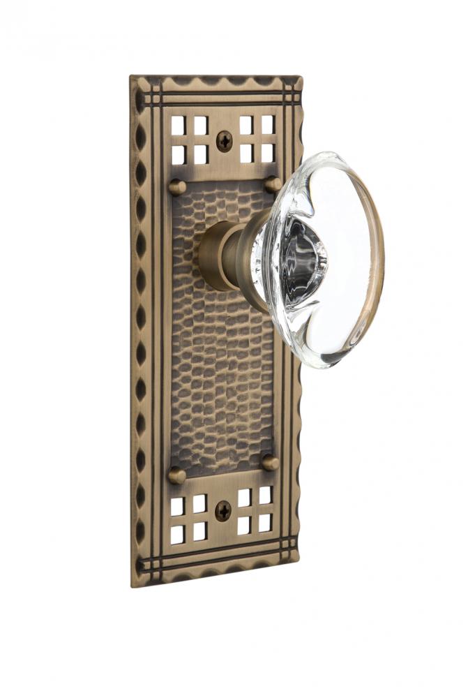 Nostalgic Warehouse Craftsman Plate Single Dummy Oval Clear Crystal Glass Door Knob in Antique Bra