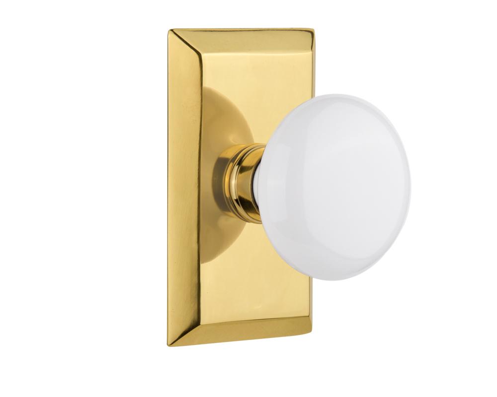 Nostalgic Warehouse Studio Plate Privacy White Porcelain Door Knob in Polished Brass