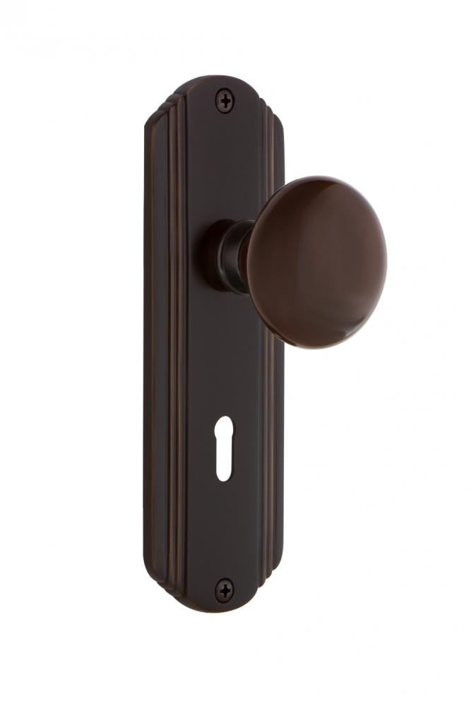 Nostalgic Warehouse Deco Plate with Keyhole Privacy Brown Porcelain Door Knob in Timeless Bronze