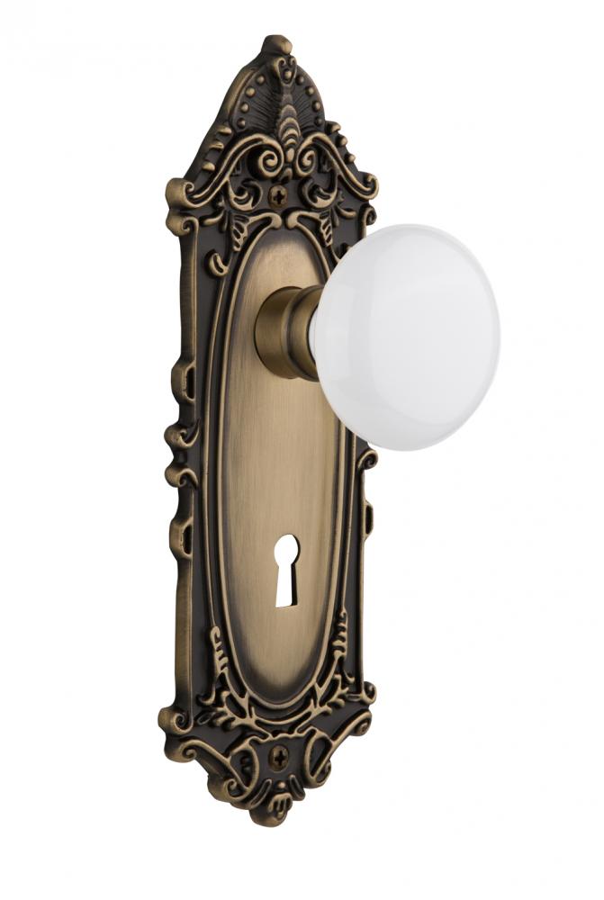 Nostalgic Warehouse Victorian Plate with Keyhole Privacy White Porcelain Door Knob in Antique Bras
