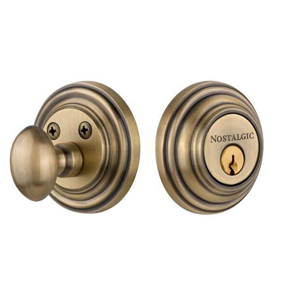 Nostalgic Warehouse Classic Rosette Single Cylinder Deadbolt in Antique Brass