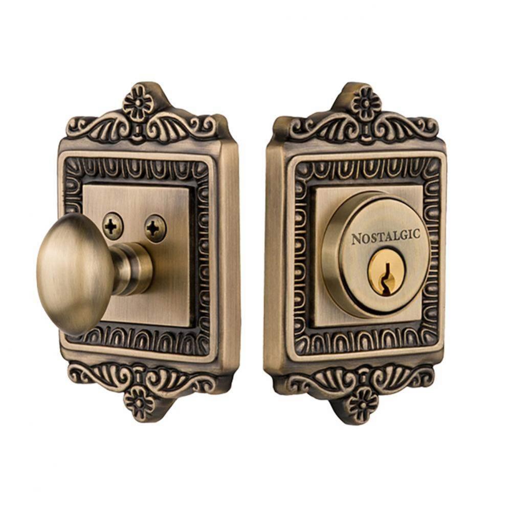 Nostalgic Warehouse Egg & Dart Plate Single Cylinder Deadbolt in Antique Brass