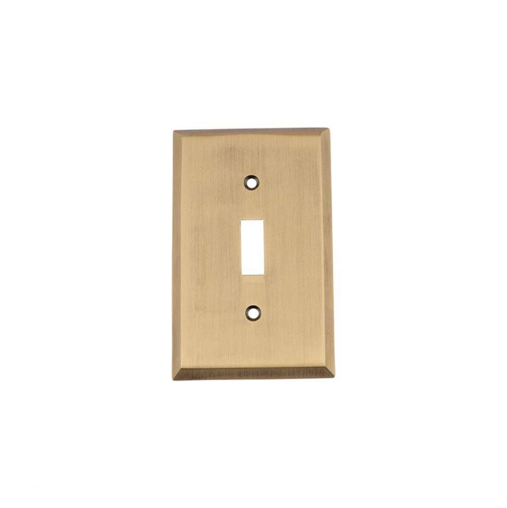 Nostalgic Warehouse New York Switch Plate with Single Toggle in Antique Brass