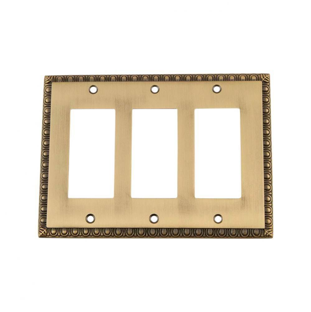 Nostalgic Warehouse Egg & Dart Switch Plate with Triple Rocker in Antique Brass