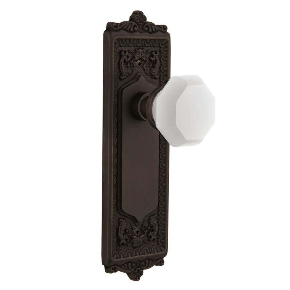 Nostalgic Warehouse Egg & Dart Plate Passage Waldorf White Milk Glass Knob in Oil-Rubbed Bronz