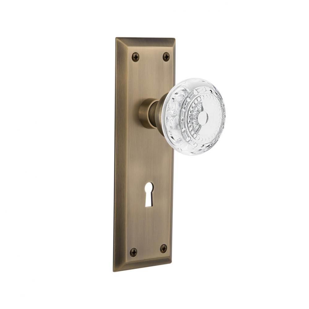 Nostalgic Warehouse New York Plate Passage with Keyhole Crystal Meadows Knob in Antique Brass